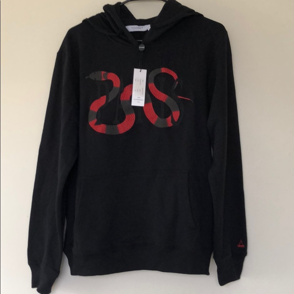 Eleven Paris Snake Graphic Pullover sweatshirt.